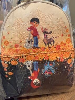 Loungefly Coco Mini Backpack in Cream, Black and Orange Floral